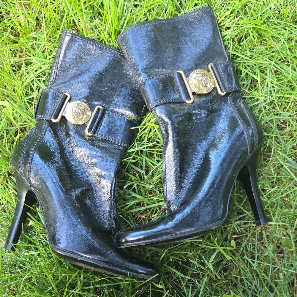 Gucci Shiny Black Heeled Boots with Gold Accents